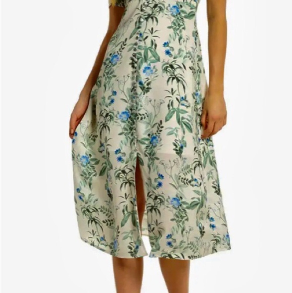 Gal Meets Glam 40s style Midi Dress in Cream and Green
The Lauren Dress - Picture 4 of 13